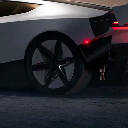 Rear wheel and wing in red light